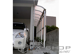 のテラス屋根 ヴェクター R型 連棟 テラスタイプ 積雪〜20cm対応 上止め仕様＋前面パネル［2段/4.5間用］ 施工例