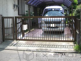 のカーゲート スウィングアップゲート 縦格子型 電動式 施工例