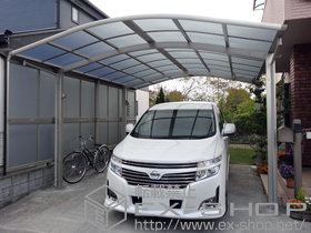 のカーポート レイナツインポートグラン　積雪〜20cm対応+レイナツインポートグラン用　サイドパネル+水平式物干し 施工例