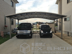 のカーポート カーブポートシグマIII ワイド 積雪〜20cm対応＋収納式物干し　ロングタイプ　2本入 施工例