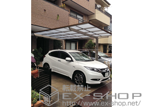 のカーポート アーキフィットプラス 積雪〜20cm対応＋竿掛けセットD(2本入り)
色：シャイングレー 施工例