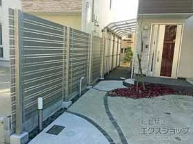 LIXIL(リクシル)のテラス屋根 スピーネストックヤードR型 パネルタイプ スクリーン仕様 1500タイプ 積雪～50cm対応 施工例