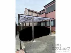 LIXIL(リクシル)のカーポート フーゴF (フラットスタイル) ワイド 積雪〜20cm対応+スピーネ 壁付け物干し 施工例