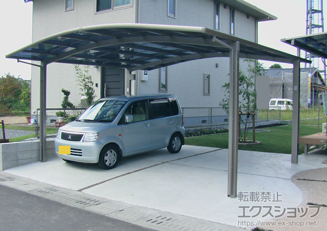 鹿児島県薩摩川内市のLIXIL リクシル（トステム）のカーポート カーブポートシグマIII ワイド　積雪〜30?対応 施工例
