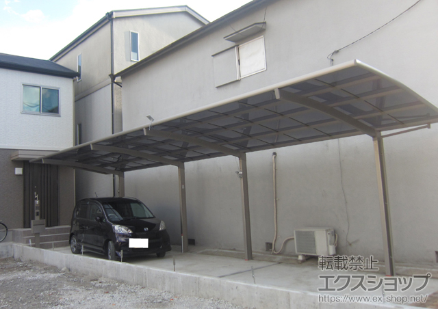 大阪府堺市のLIXIL リクシル（トステム）のカーポート カーブポートシグマIII 縦連棟　積雪〜30cm対応 施工例