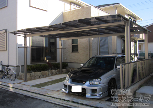 愛知県名古屋市のLIXIL リクシル（トステム）のカーポート エックスルーフ ワイド 積雪〜30cm対応+エックスルーフ ワイド用 収納式物干し 施工例