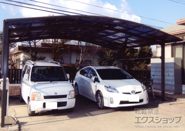 大分県大分市のLIXIL リクシル（トステム）のカーポート カーブポートシグマIII ワイド 積雪〜30cm対応＋収納式物干し＋サイドパネル 施工例