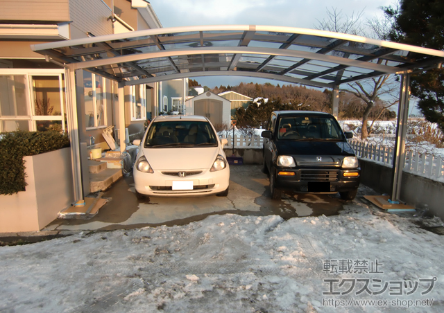 青森県三沢市のLIXIL リクシル（トステム）のカーポート カーブポートシグマIII ワイド 積雪〜30cm対応 施工例