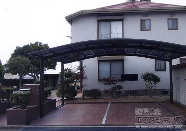愛媛県松山市のLIXIL リクシル（トステム）のカーポート カーブポートシグマIII ワイド 積雪〜30cm対応 施工例