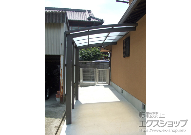 大阪府堺市のLIXIL リクシル（トステム）のサイクルポート・駐輪場 カーブパークシグマIII パネル1面囲 積雪〜20?対応 施工例