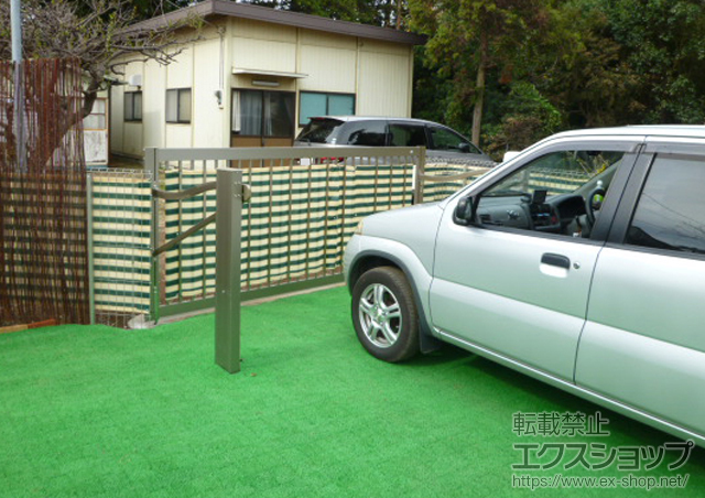 千葉県鎌ヶ谷市ののカーゲート スウィングアップゲート 縦格子型 電動式 施工例