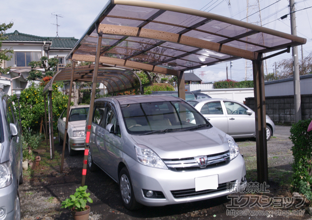 神奈川県横浜市のLIXIL リクシル（トステム）のカーポート カーブポートシグマIII 積雪〜30cm対応+着脱式サポート　ロング柱23用 ×2本 施工例