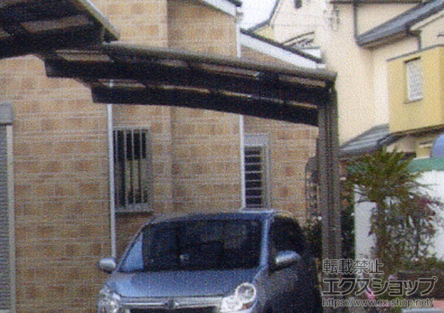 大阪府泉佐野市のLIXIL リクシル（トステム）のカーポート カーブポートシグマ?　積雪〜30cm対応+収納式物干し 施工例