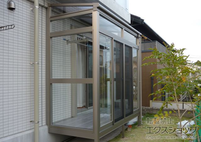 鹿児島県鹿児島市のLIXIL リクシル（トステム）のテラス囲い・サンルーム ほせるんですII F型 床納まり ランマ付き 積雪〜20cm対応 施工例