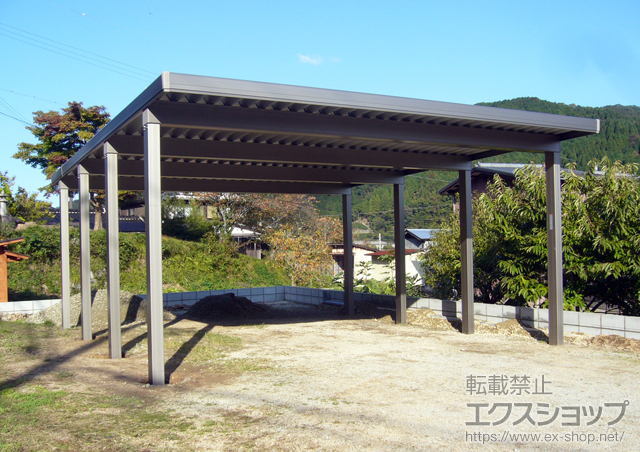 兵庫県豊岡市のLIXIL リクシル（トステム）のカーポート テリオスポートIII 4500 2台用 奥行延長 8本柱 積雪〜150ｃｍ対応 施工例