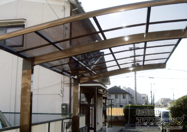 大阪府四條畷市のLIXIL リクシル（トステム）のカーポート カーブポートシグマIII 積雪〜30cm対応 施工例