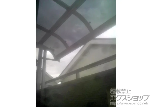 大阪府枚方市のLIXIL リクシル（トステム）のバルコニー・ベランダ屋根 パワーアルファ RB型 屋根タイプ 単体 積雪～30cm対応 施工例