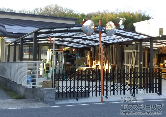 奈良県生駒市のLIXIL リクシル（トステム）のカーポート カーブポートシグマIII ワイド 連棟用 積雪〜30cm対応 施工例