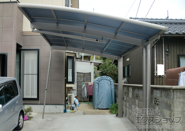 鳥取県米子市のLIXIL リクシル（トステム）のカーポート カーブポートシグマIII 積雪〜30ｃｍ対応+収納式サポート（補助柱） 施工例