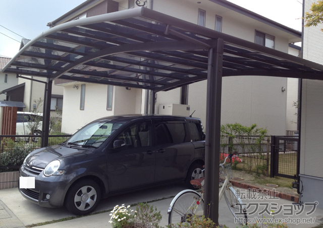 福岡県福岡市のLIXIL リクシル（トステム）のカーポート カーブポートシグマIII ワイド 積雪〜30cm対応 施工例