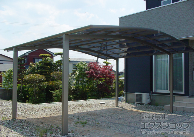 徳島県小松島市のLIXIL リクシル（トステム）のカーポート カーブポートシグマIII ワイド 積雪〜30cm対応+吊り下げ式物干し　ワイドタイプ 施工例