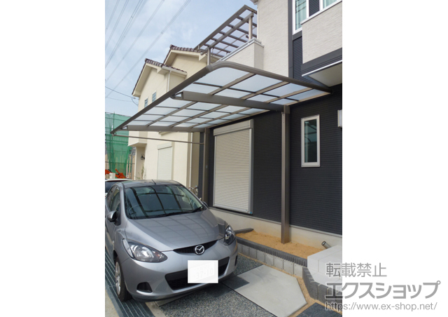 大阪府枚方市のLIXIL リクシル（トステム）のカーポート レガーナポートシグマIII　雨樋あり　積雪〜30cm対応 施工例