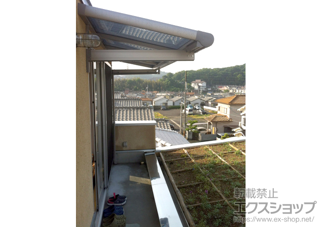 大阪府河内長野市のLIXIL リクシル（トステム）のバルコニー・ベランダ屋根 パワーアルファー F型 3階用 ルーフタイプ 積雪対応〜30? 施工例