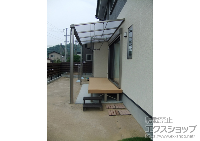 佐賀県唐津市のLIXIL リクシル（トステム）のテラス屋根 ライザーテラスII F型 テラスタイプ 単体 積雪〜20ｃｍ対応+吊り下げ物干し 施工例