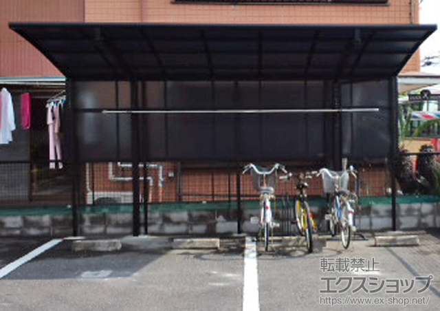 千葉県市原市のLIXIL リクシル（トステム）のカーポート カーブポートシグマIII+サイドパネル 2段(H500+H800)+着脱式サポート 標準 2本入り+ 収納式物干し 標準 2本入り 施工例