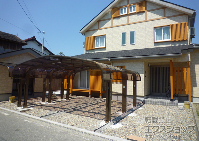 山形県酒田市のLIXIL リクシル（トステム）のカーポート テールポートシグマIII 1500 M合掌 積雪〜50cm対応 施工例
