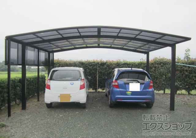 熊本県山鹿市のLIXIL リクシル（トステム）のカーポート カーブポートシグマIII ワイド 積雪〜30cm対応+カーブポートシグマIII サイドパネル 施工例
