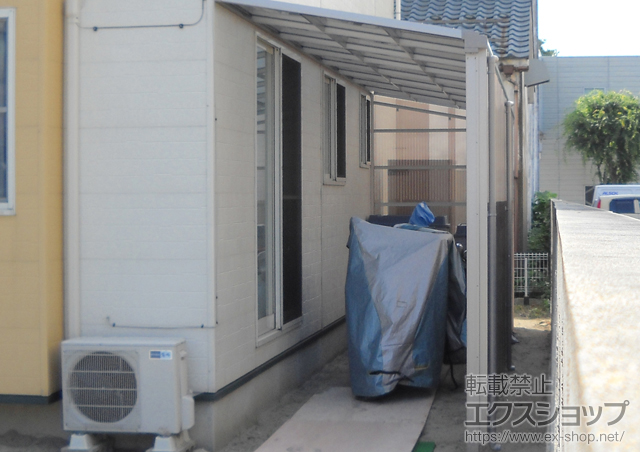 新潟県新潟市のLIXIL リクシル（トステム）のテラス屋根 ライザーテラスII F型 1500 テラスタイプ 積雪〜50?対応 2面ポリカ波板囲い 施工例