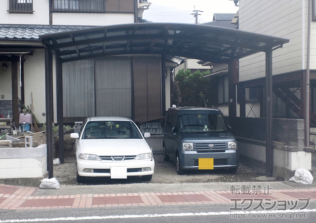 鹿児島県姶良郡加治木町のLIXIL リクシル（トステム）のカーポート カーブポートシグマIII ワイド　 積雪〜30cm対応 施工例