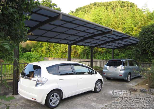 福島県南相馬市のLIXIL リクシル（トステム）のカーポート カーブポートシグマIII 縦連棟 耐風圧強度仕様 積雪〜30?対応 施工例