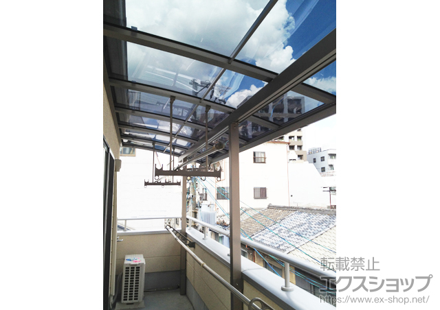 大阪府大阪市天王寺区のLIXIL リクシル（トステム）のバルコニー・ベランダ屋根 パワーアルファ L型 屋根タイプ 連棟 積雪〜30?対応 施工例