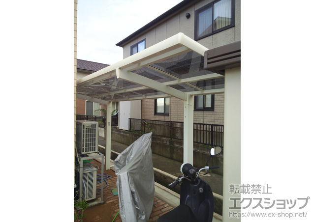 石川県金沢市のLIXIL リクシル（トステム）のサイクルポート・駐輪場 カーブポートシグマＩＩＩ ミニ 積雪〜30ｃｍ対応 施工例