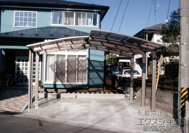 青森県八戸市のLIXIL リクシル（トステム）のカーポート カーブポートシグマIII M合掌 積雪〜30cm対応 施工例