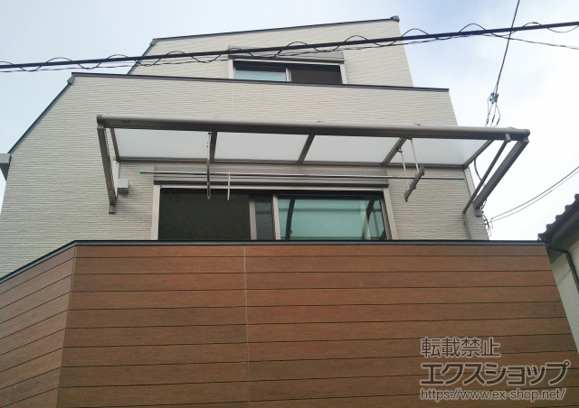 大阪府茨木市のLIXIL リクシル（トステム）のバルコニー・ベランダ屋根 ライザーテラスII R型 ルーフタイプ 単体 積雪〜20cm対応 施工例