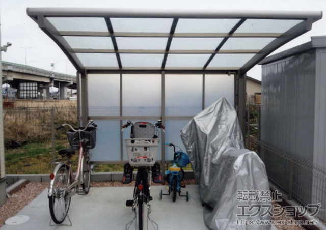 大阪府堺市のLIXIL リクシル（トステム）のサイクルポート・駐輪場 カーブパークシグマIII パネル1面囲い 積雪〜20cm対応 施工例