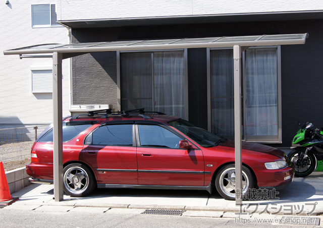 千葉県市川市のLIXIL リクシル（トステム）のカーポート カーブポートシグマIII 積雪〜20cm対応＋着脱式サポート　ロング柱23用　1本入 施工例