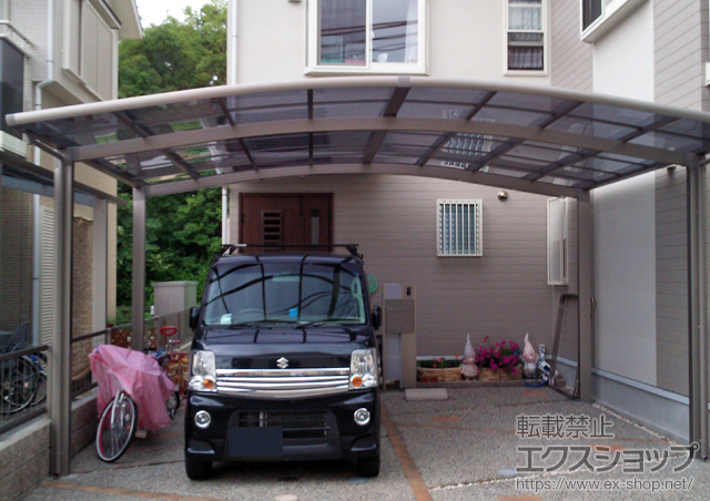 大阪府交野市のLIXIL リクシル（トステム）のカーポート カーブポートシグマIII ワイド 積雪〜20cm対応 施工例