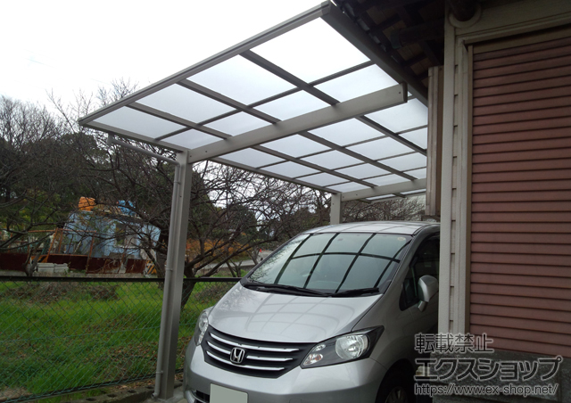 大阪府大阪狭山市ののカーポート エフルージュグラン　積雪〜20cm対応+エフルージュグラン用 変形敷地対応セット 斜め切詰め用前枠 施工例