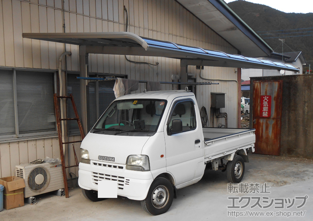 群馬県桐生市のLIXIL リクシル（トステム）のカーポート レガーナポートシグマIII 積雪〜20cm対応　雨樋なし＋収納式物干し　ロングタイプ　2本入 施工例