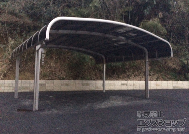 福岡県宮若市のLIXIL リクシル（トステム）のカーポート テールポートシグマIII ワイド 積雪〜20cm対応+収納式物干し　標準2本入 施工例
