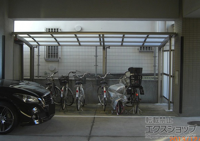 東京都江東区のLIXIL リクシル（トステム）のサイクルポート・駐輪場 カーブパークシグマIII 側面1面囲い 積雪〜20cm対応 施工例