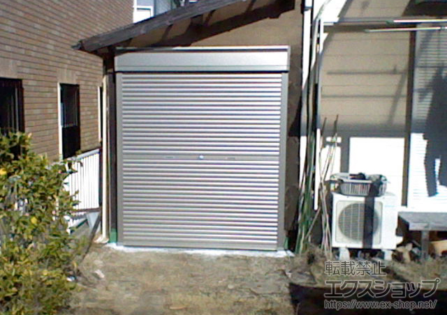 愛知県豊田市のLIXIL リクシル（トステム）のガレージシャッター ガレージシャッタークワトロ 手動式 外部付タイプ 施工例