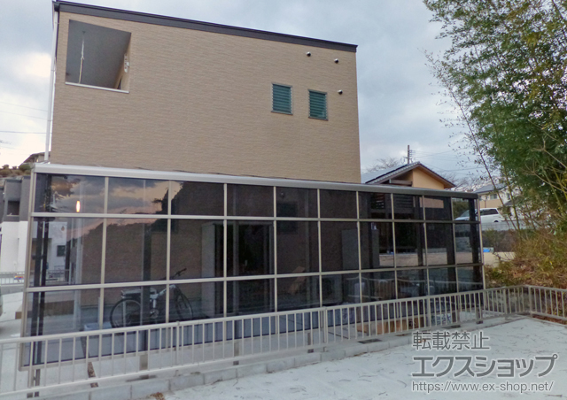 大分県大分市のLIXIL リクシル（トステム）のカーポート ルーフポートシグマIII 延長 積雪〜20cm対応＋ルーフポートシグマIII サイドパネル 3段＋ルーフポートシグマIII 収納式物干し 2本入 施工例