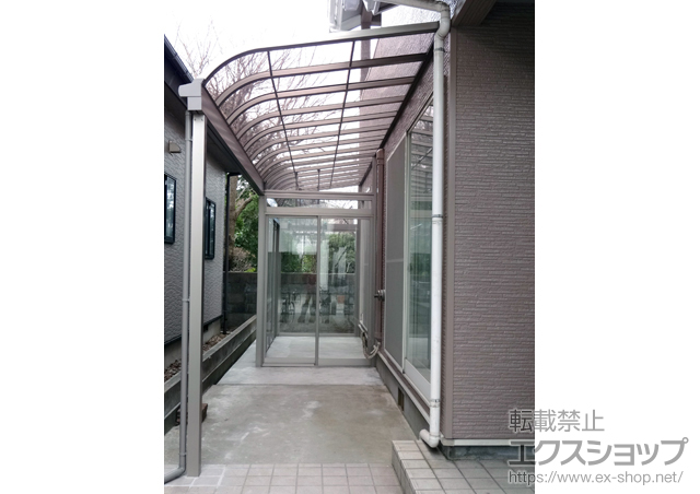 秋田県秋田市のLIXIL リクシル（トステム）のテラス囲い・サンルーム ほせるんですII 1500 R型 土間納まり 部分囲い ランマ無し 積雪~50cm対応＋吊り下げ物干し 標準 3本入 施工例