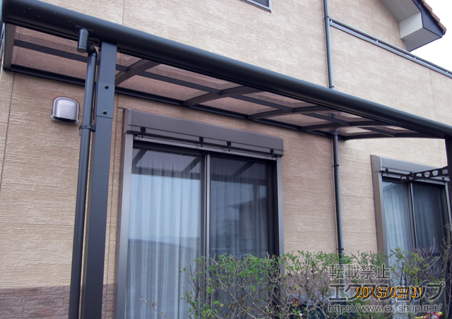 岡山県都窪郡早島町のLIXIL リクシル（トステム）のテラス屋根 パワーアルファ L型 テラスタイプ 単体　積雪〜30cm対応＋柱位置固定タイプ（柱2本）/ロング柱 施工例