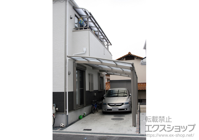 大阪府枚方市のLIXIL リクシル（トステム）のカーポート カーブポートシグマIII 縦連棟 積雪〜20cm対応 施工例